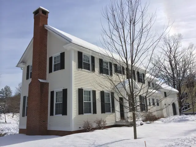 White center-chimney colonial in winter
