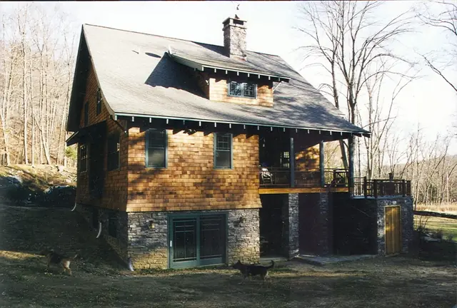 Stone and timber home with a covered porch