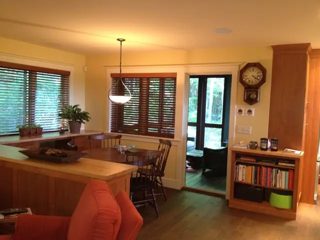 Kitchen and dining area with wood cabinetry